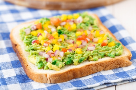 Delicious vegetarian sandwich with avocado and vegetablesの写真素材