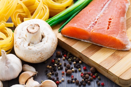 Ingredients for italian dish. Salmon pasta with mushroomsの写真素材