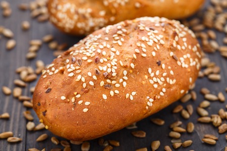 Tasty fresh bun with sesame and sunflower seeds