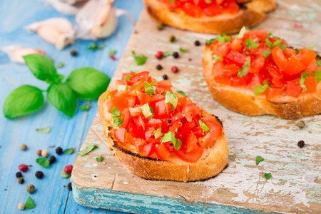 Italian tomato bruschetta with basilの写真素材