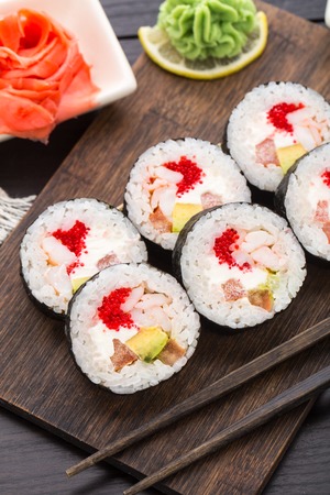 Sushi rolls with tobiko and shrimpsの写真素材