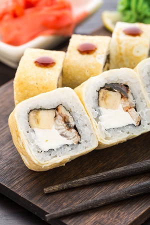 Sushi rolls with smoked eel and bananaの写真素材