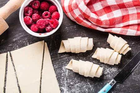 Making croissants with raspberriesの写真素材