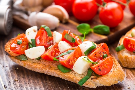 Bruschetta with cherry tomato and mozzarellaの写真素材
