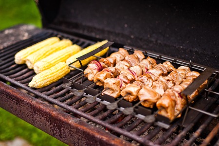 Barbecue meat and cornの写真素材