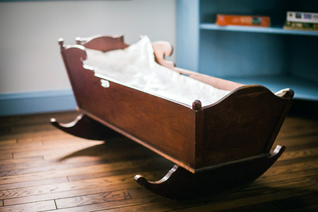 wooden vintage cradleの写真素材
