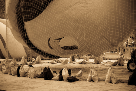 Macys parade - Preparations before the parade. NEW YORK - NOVEMBER 21: Balloons are being inflated at the 86th Annual Macys Thanksgiving Day Parade on November 21, 2012 in New York Cityのeditorial素材