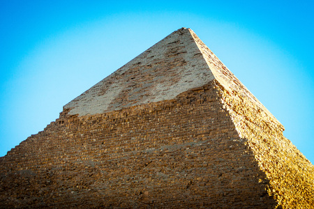 Pyramid of Cairo at sunset with nooneの写真素材