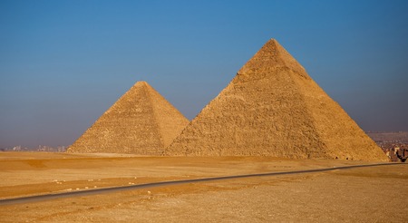 Pyramids of Cairo at sunset with nooneの写真素材