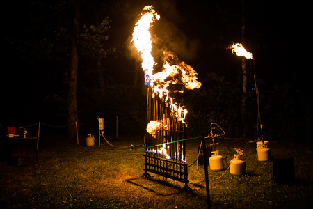 Pyrophone fire organ at night playing musicの写真素材