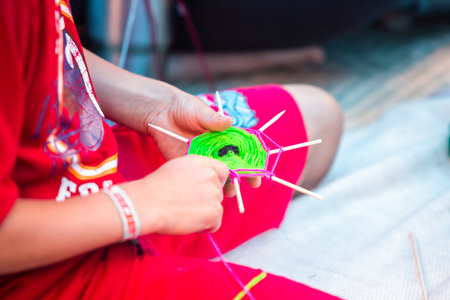 Kids creating mandala with different colors handmadeの写真素材
