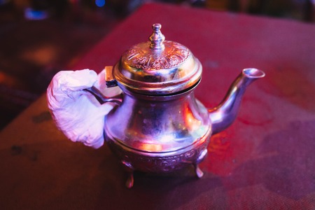 Vintage Arabian teapot at night close upの写真素材