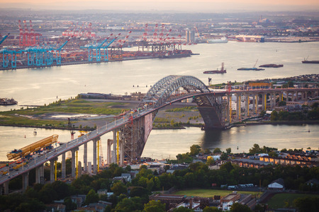 Aerial view of the bridge over the river at dawn
