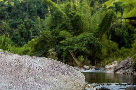 Ancient carved figures Piedra Escrita in Jayuya Puerto Rico