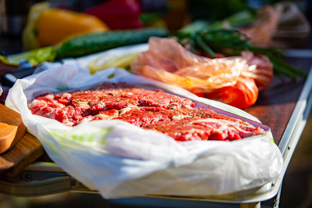 Raw meet marinated with vegetables ready to cook