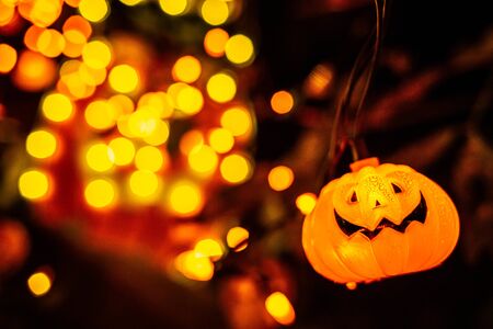 Scary halloween decorations outdoors at night close upの写真素材