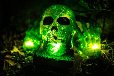 Scary halloween decorations outdoors at night close upの写真素材