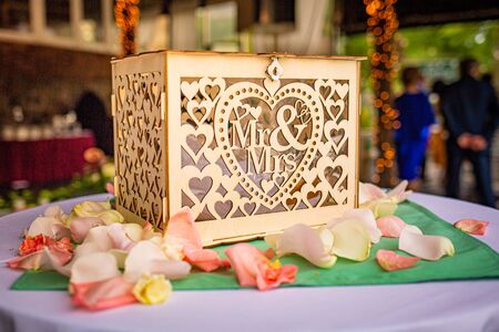 Wedding gift donation box on the table summer day
