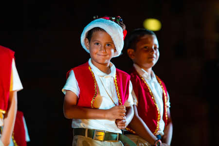 San Pedro, Belize - 12/1/2019: School kids public Christmas songs and dance performance