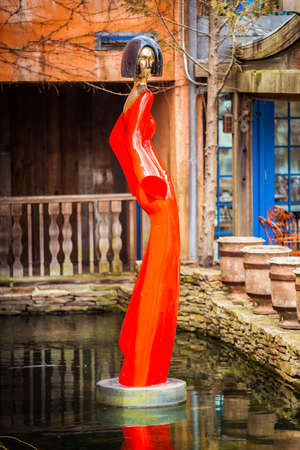 Hamilton, NJ / USA: 3/28/2015 - Summertime lady - Grounds for sculptures art center parkのeditorial素材