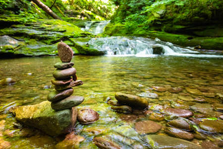 Beautiful rocky sundown forest river cascades summer day