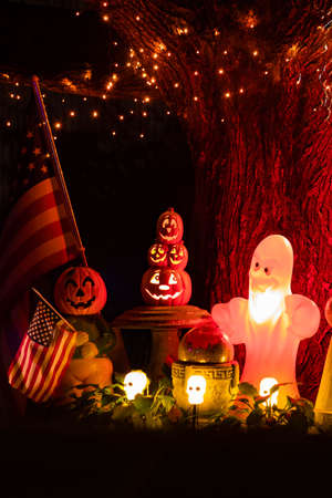 Illuminated scary Halloween traditional decoration outdoor at fallの写真素材