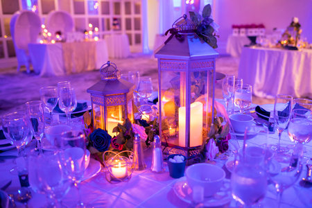 Romantic table setup for special event with candles indoorの写真素材