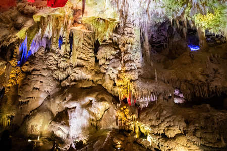 Colorful underground Prometheus Cave formations illuminated, Imereti region of Georgiaの写真素材