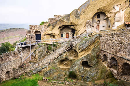 View of David Gareja Lavra orthodox monastery caves built in rock Georgiaの写真素材