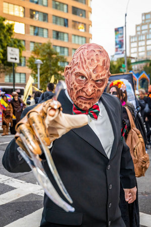 New York, NY - October 31, 2021:Zombie dead walking at NYC Village Halloween parade