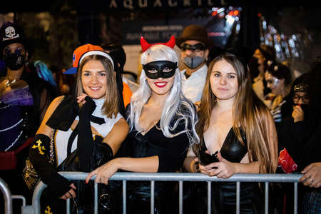 New York, NY - October 31, 2021: Scary clowns and witches costumes at NYC Village Halloween paradeのeditorial素材