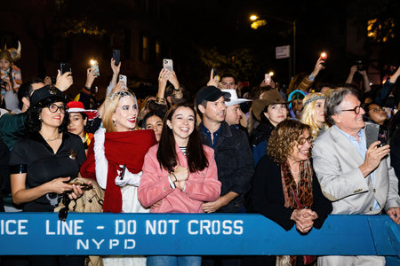 New York, NY - October 31, 2021: Spectators at NYC Village Halloween parade
