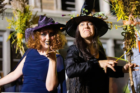 New York, NY - October 31, 2021:Group of cute and scary witches at NYC Village Halloween parade