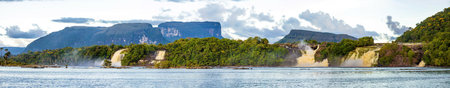 Scenic panoramic view of waterfalls from Carrao river in Canaima national Park Venezuela at sunsetの写真素材