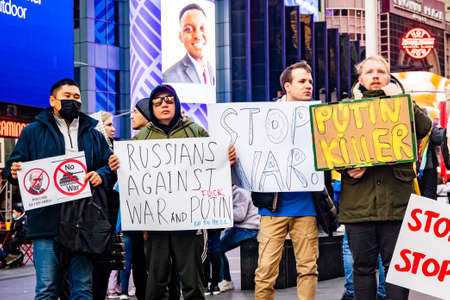 New York, NY - 02-27-2022: Civil protests agains Russian war in Ukraine at Times Square