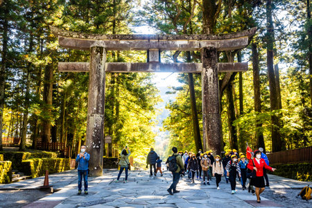 Nikko, Japan - October 19, 2022: Stone Torii gate ishidorii at Nikko Toshogu Shrine complex at fallのeditorial素材