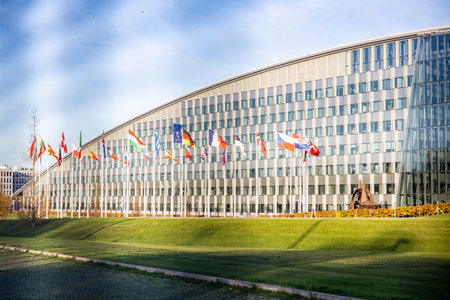 Brussels, Belgium - November 10, 2022: NATO building headquarters with flags and symbolのeditorial素材