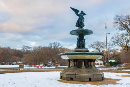 Bethesda fountain with angel statue in New York Central park in winter and icy pond nobodyの写真素材