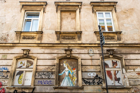 Krakow, Poland - 09-06-2023: Street art decorations on Krakow buildings city centerのeditorial素材