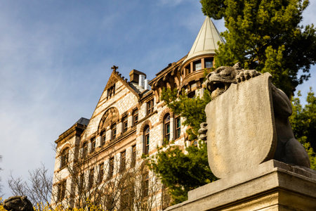 Princeton, NJ, USA - 03-31-2024: Witherspoon Hall with marble tigers at Princeton University during sunsetの写真素材
