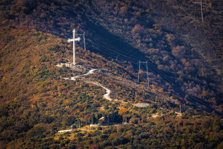 Big cross monument at Boko-kotor bay in Montenegro from afarの写真素材