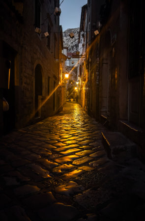 Charming stone streets of Kotor old town at night illuminatedの写真素材