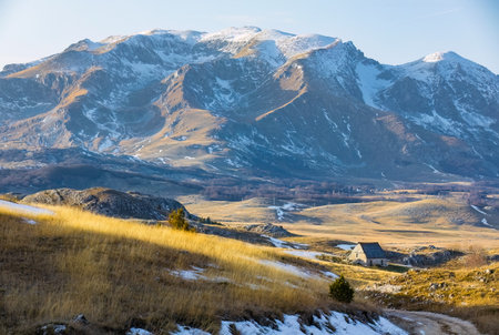 Village houses at durmitor national park in Montenegro at sunny winter dayの写真素材