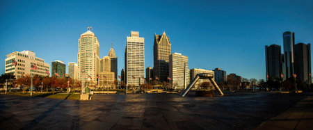 Scenic panoramic photo of Hart Plaza in downtown Detroit, Michigan, featuring surrounding skyscrapers, historic monuments, and views along the Detroit Riverの写真素材