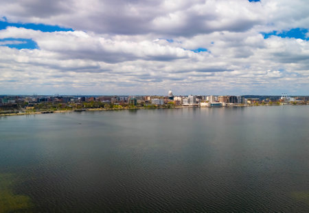 Panoramic Madison Wisconsin skyline with State Capitol and modern buildings as seen from Lake Mendotaの写真素材