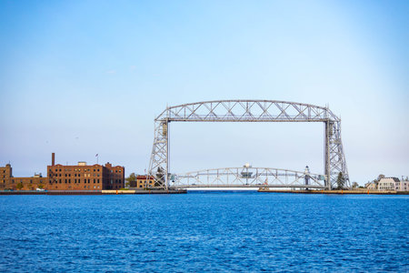 Detailed view of the iconic Duluth Aerial Lift Bridge highlighting its engineering and historic significance in Minnesotaの写真素材