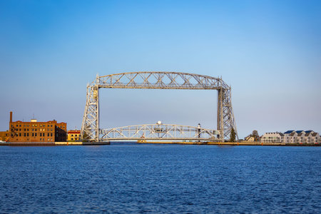 Detailed view of the iconic Duluth Aerial Lift Bridge highlighting its engineering and historic significance in Minnesotaの写真素材