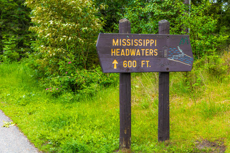 A sign marking the trail to the Mississippi Headwaters, guiding visitors to the source of this iconic river.の写真素材