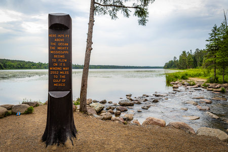 A sign marking the trail to the Mississippi Headwaters, guiding visitors to the source of this iconic river.の写真素材