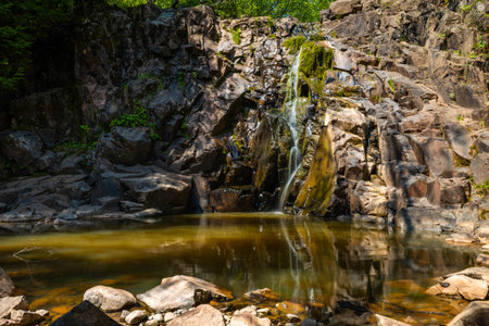 Tiny waterfall along the Split Rock River trail, showcasing the natural beauty found along this popular hiking routeの写真素材